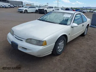 1995 Ford Thunderbird LX with VIN 1FALP62W1SH168074, listed as a IAAI auction lot 41995575 with 232,742 mi miles. Bid and sale history available at carsss.com. Image 2.