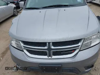 2019 Dodge Journey SE with VIN 3C4PDCBB0KT816103, listed as a IAAI auction lot 41640272 with 118,310 mi miles and . Bid and sale history available at DreamBid. Image 12.