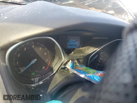 2012 Ford Focus SE with VIN 1FAHP3F20CL211460, listed as a Copart auction lot 62668645 with 151,334 mi miles and Salvage title. Bid and sale history available at DreamBid. Image 9.