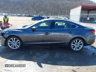 2016 Mazda Mazda6 i Touring with VIN JM1GJ1V57G1460363, listed as a IAAI auction lot 41742896 with 145,819 mi miles. Bid and sale history available at carsss.com. Image 14.