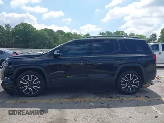 2021 GMC Acadia SLT with VIN 1GKKNMLS0MZ136228, listed as a IAAI auction lot 42445381 with 65,700 mi miles and . Bid and sale history available at DreamBid. Image 14.