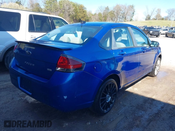 2010 Ford Focus SES with VIN 1FAHP3GN8AW165221, listed as a IAAI auction lot 41864224 with 148,785 mi miles. Bid and sale history available at carsss.com. Image 4.