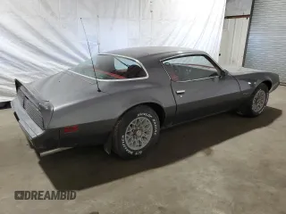 1981 Pontiac Firebird z VIN 1G2AS87A4BN117926, wystawiony jako Copart lot #63220014 z przebiegiem 54 759 mil mil oraz Tytuł czysty. Historia ofert i sprzedaży dostępna na DreamBid. Obrazek 3.