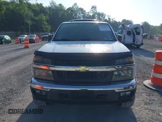 2007 Chevrolet Colorado 1LT z VIN 1GCDT13E978249656, wystawiony jako IAAI lot #42445862 z przebiegiem 115 298 mil mil oraz . Historia ofert i sprzedaży dostępna na DreamBid. Obrazek 12.