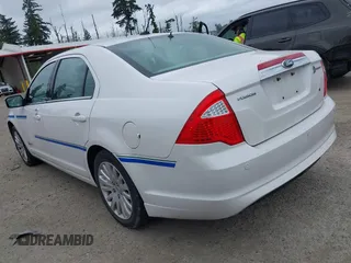 2011 Ford Fusion Hybrid z VIN 3FADP0L34BR202769, wystawiony jako IAAI lot #42504494 z przebiegiem 33 902 mil mil oraz . Historia ofert i sprzedaży dostępna na DreamBid. Obrazek 3.