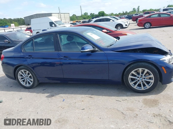 2018 BMW 3 Series 320i with VIN WBA8E1G56JNU92997, listed as a IAAI auction lot 42039869 with 105,085 mi miles. Bid and sale history available at carsss.com. Image 12.