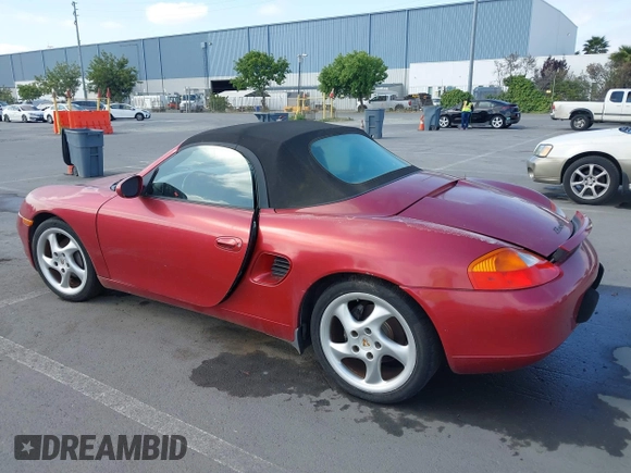 2002 Porsche Boxster z VIN WP0CA29842U621669, wystawiony jako IAAI lot #42218784 z przebiegiem 109 578 mil mil oraz . Historia ofert i sprzedaży dostępna na DreamBid. Obrazek 3.