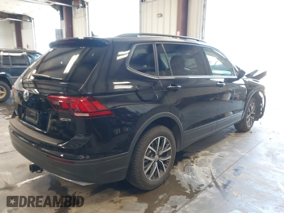 2021 Volkswagen Tiguan S with VIN 3VV0B7AX8MM020189, listed as a IAAI auction lot 42615767 with 70,294 mi miles and . Bid and sale history available at DreamBid. Image 4.