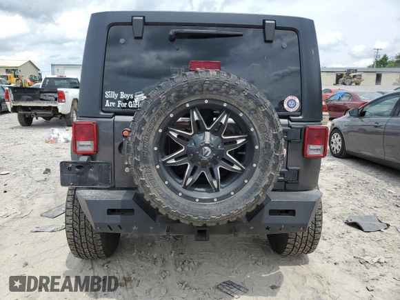 2017 Jeep Wrangler Unlimited Rubicon Recon with VIN 1C4HJWFG3HL510439, listed as a Copart auction lot 60791165 with 125,955 mi miles and Salvage title. Bid and sale history available at DreamBid. Image 6.