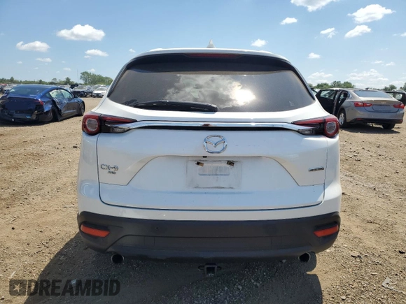 2020 Mazda CX-9 Touring z VIN JM3TCBCY7L0404779, wystawiony jako Copart lot #62895755 z przebiegiem 46 472 mil mil oraz Szkoda całkowita • Salvage title. Historia ofert i sprzedaży dostępna na DreamBid. Obrazek 6.