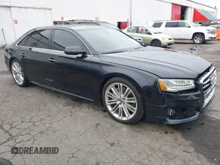 2017 Audi A8 L Sport with VIN WAU43AFD1HN007334, listed as a IAAI auction lot 41760035 with 67,342 mi miles. Bid and sale history available at carsss.com. Image 1.