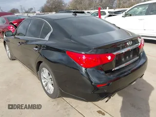2015 Infiniti Q50 z VIN JN1BV7AP3FM335871, wystawiony jako IAAI lot #41472424 z przebiegiem 127 383 mil mil oraz . Historia ofert i sprzedaży dostępna na DreamBid. Obrazek 3.