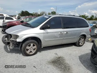 2005 Dodge Caravan SXT with VIN 2D8GP44L75R513413, listed as a Copart auction lot 64074335 with 242,079 mi miles and Salvage title. Bid and sale history available at DreamBid. Image 1.