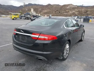2013 Jaguar XF I4 RWD with VIN SAJWA0ES0DPS64027, listed as a IAAI auction lot 41569121 with 103,115 mi miles. Bid and sale history available at carsss.com. Image 4.