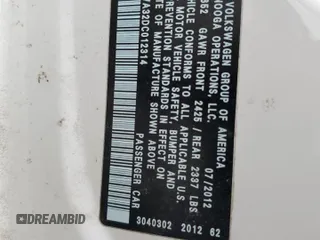 2013 Volkswagen Passat SEL Premium z VIN 1VWCN7A32DC012314, wystawiony jako Copart lot #58093405 z przebiegiem Nie podano mil oraz Szkoda całkowita • Salvage title. Historia ofert i sprzedaży dostępna na DreamBid. Obrazek 12.