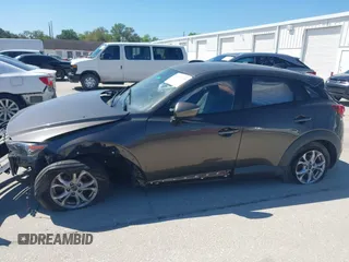 2016 Mazda CX-3 Touring with VIN JM1DKBC7XG0114940, listed as a IAAI auction lot 41777630 with 71,275 mi miles and . Bid and sale history available at DreamBid. Image 14.