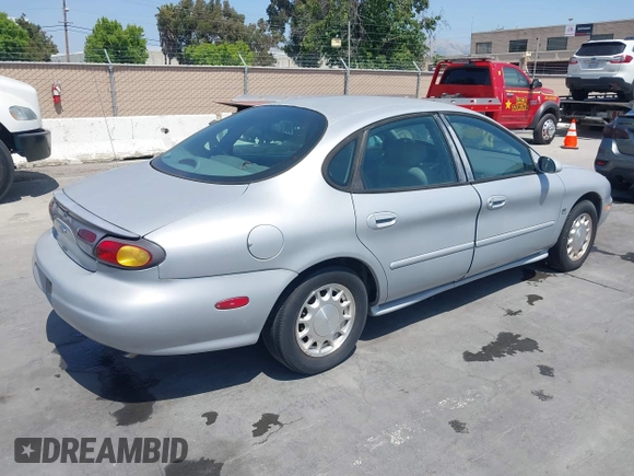 1996 Ford Taurus LX with VIN 1FALP53S5TG199843, listed as a IAAI auction lot 42430761 with 95,984 mi miles and . Bid and sale history available at DreamBid. Image 4.