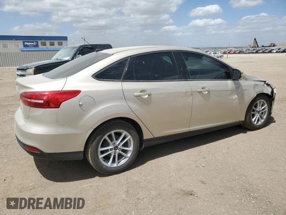 2017 Ford Focus SE with VIN 1FADP3F28HL299535, listed as a Copart auction lot 56958885 with 102,179 mi miles and Clean title. Bid and sale history available at DreamBid. Image 3.