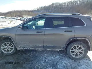 2018 Jeep Cherokee Latitude z VIN 1C4PJMCX2JD570426, wystawiony jako IAAI lot #41394183 z przebiegiem 182 419 mil mil oraz . Historia ofert i sprzedaży dostępna na DreamBid. Obrazek 14.