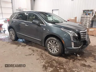 2019 Cadillac XT5 Luxury AWD z VIN 1GYKNDRS0KZ213092, wystawiony jako IAAI lot #41510497 z przebiegiem 26 030 mil mil oraz . Historia ofert i sprzedaży dostępna na DreamBid. Obrazek 1.