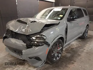 2023 Dodge Durango SRT Hellcat Premium with VIN 1C4SDJH9XPC655507, listed as a IAAI auction lot 42172418 with 1,490 mi miles and . Bid and sale history available at DreamBid. Image 2.