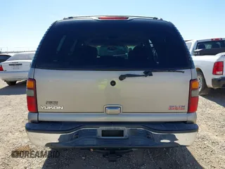 2003 GMC Yukon SLT with VIN 1GKEC13V33R298333, listed as a IAAI auction lot 41582447 with 166,047 mi miles. Bid and sale history available at carsss.com. Image 16.