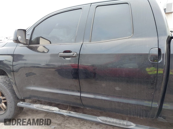 2014 Toyota Tundra 4WD Truck SR with VIN 5TFUM5F14EX051843, listed as a IAAI auction lot 41773983 with 145,089 mi miles. Bid and sale history available at carsss.com. Image 14.