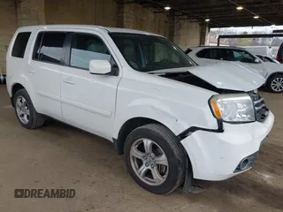 2014 Honda Pilot EX-L with VIN 5FNYF4H59EB047609, listed as a IAAI auction lot 42071353 with 148,661 mi miles. Bid and sale history available at carsss.com. Image 1.
