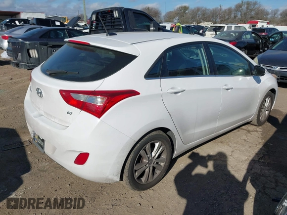 2014 Hyundai Elantra GT with VIN KMHD35LH6EU180152, listed as a IAAI auction lot 41674456 with 113,763 mi miles. Bid and sale history available at carsss.com. Image 4.