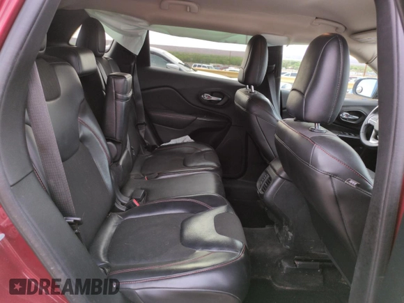 2015 Jeep Cherokee Trailhawk z VIN 1C4PJMBSXFW649425, wystawiony jako Copart lot #52900735 z przebiegiem 89 345 mil mil oraz Szkoda całkowita • Salvage title. Historia ofert i sprzedaży dostępna na DreamBid. Obrazek 11.