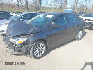 2018 Ford Focus SE z VIN 1FADP3F2XJL316101, wystawiony jako IAAI lot #40805650 z przebiegiem 53 551 mil mil oraz . Historia ofert i sprzedaży dostępna na DreamBid. Obrazek 16.