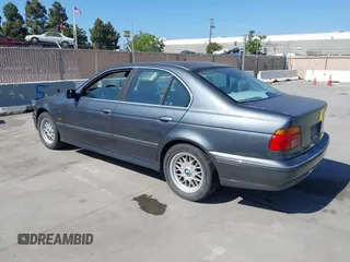 2000 BMW 5 Series 528iA with VIN WBADM634XYGU07427, listed as a IAAI auction lot 42085048 with 192,828 mi miles. Bid and sale history available at carsss.com. Image 3.