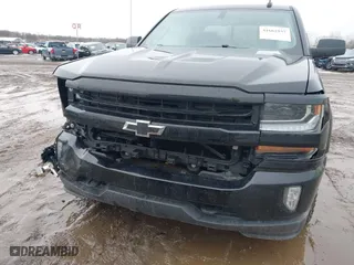 2018 Chevrolet Silverado 1500 LT with VIN 1GCVKREC0JZ323808, listed as a IAAI auction lot 41662857 with 138,110 mi miles. Bid and sale history available at carsss.com. Image 6.