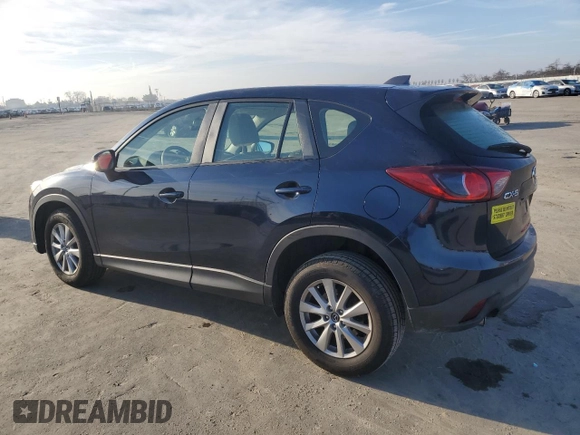 2015 Mazda CX-5 Sport z VIN JM3KE2BE6F0491107, wystawiony jako Copart lot #42462395 z przebiegiem 82 528 mil mil oraz Szkoda całkowita • Salvage title. Historia ofert i sprzedaży dostępna na DreamBid. Obrazek 2.