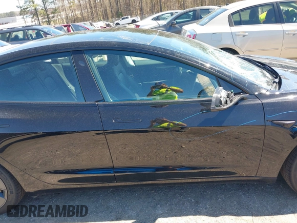 2022 Tesla Model 3 Long Range with VIN 5YJ3E1EB3NF104313, listed as a IAAI auction lot 41832803 with 39,061 mi miles and . Bid and sale history available at DreamBid. Image 13.