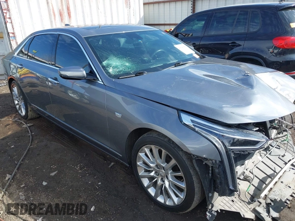 2019 Cadillac CT6 Luxury AWD z VIN 1G6KB5RS6KU117472, wystawiony jako IAAI lot #41643096 z przebiegiem 80 183 mil mil oraz . Historia ofert i sprzedaży dostępna na DreamBid. Obrazek 1.