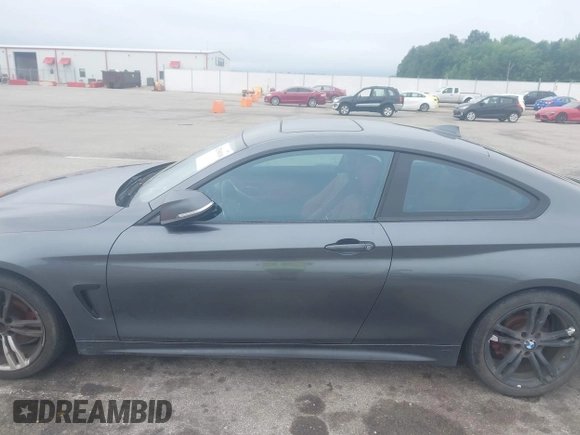 2014 BMW 4 Series 428i with VIN WBA3N7C52EK221929, listed as a IAAI auction lot 42530110 with 126,828 mi miles and . Bid and sale history available at DreamBid. Image 14.