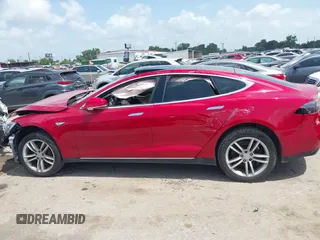 2014 Tesla Model S 60 with VIN 5YJSA1H14EFP63897, listed as a IAAI auction lot 42713272 with Not provided miles and . Bid and sale history available at DreamBid. Image 13.