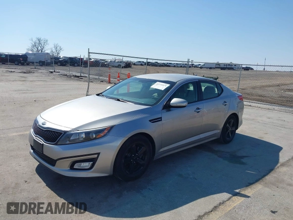 2015 Kia Optima LX with VIN 5XXGM4A78FG477630, listed as a IAAI auction lot 41771874 with 107,065 mi miles and . Bid and sale history available at DreamBid. Image 2.
