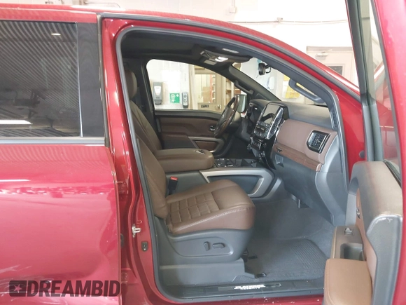2021 Nissan Titan Pro-4X with VIN 1N6AA1ED9MN525986, listed as a IAAI auction lot 41795296 with 34,395 mi miles and . Bid and sale history available at DreamBid. Image 5.