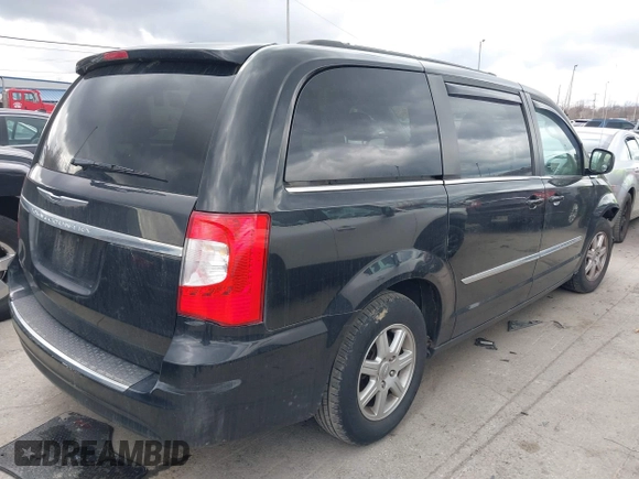 2013 Chrysler Town & Country Touring with VIN 2C4RC1BG5DR554662, listed as a IAAI auction lot 41833006 with 143,626 mi miles and . Bid and sale history available at DreamBid. Image 4.