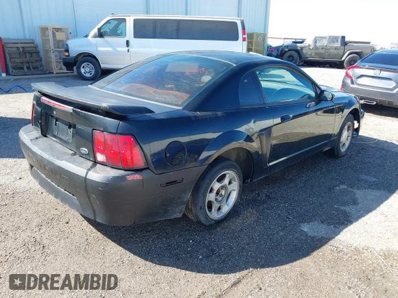 2004 Ford Mustang Standard with VIN 1FAFP40604F156534, listed as a IAAI auction lot 41794486 with 216,207 mi miles. Bid and sale history available at carsss.com. Image 4.