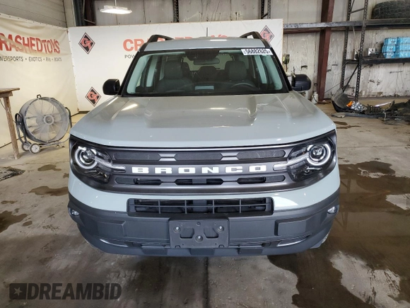 2021 Ford Bronco Sport Big Bend z VIN 3FMCR9B68MRB03127, wystawiony jako Copart lot #56882625 z przebiegiem 28 097 mil mil oraz Szkoda całkowita • Salvage title. Historia ofert i sprzedaży dostępna na DreamBid. Obrazek 5.