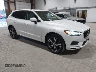 2019 Volvo XC60 Momentum z VIN LYVA22RK5KB237491, wystawiony jako IAAI lot #41744615 z przebiegiem 104 997 mil mil oraz . Historia ofert i sprzedaży dostępna na DreamBid. Obrazek 1.