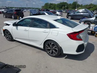 2018 Honda Civic Si with VIN 2HGFC1E53JH700251, listed as a IAAI auction lot 42043732 with 104,763 mi miles and . Bid and sale history available at DreamBid. Image 3.