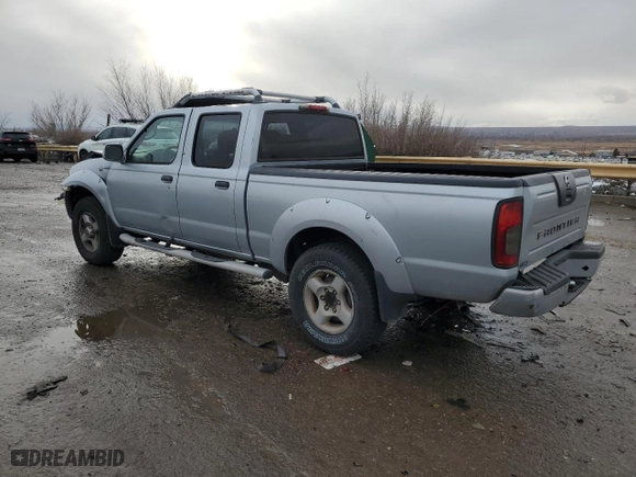 2002 Nissan Frontier 2WD SE with VIN 1N6ED29X12C364450, listed as a Copart auction lot 85708104 with 180,709 mi miles and Salvage Title. Bid and sale history available at carsss.com. Image 2.