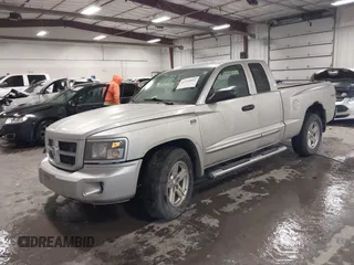 2010 Dodge Dakota with VIN 1D7CW3BP7AS103645, listed as a IAAI auction lot 41514841 with 158,125 mi miles and . Bid and sale history available at DreamBid. Image 2.