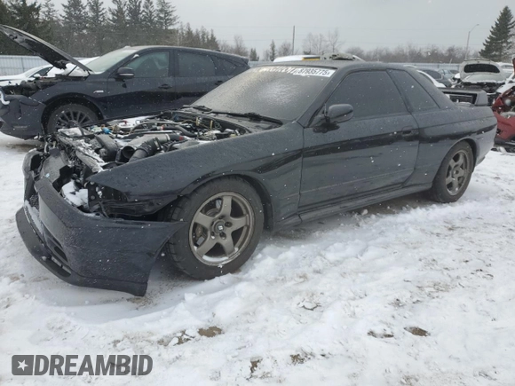 1991 Nissan Skyline z VIN BNR32016641, wystawiony jako Copart lot #87935775 z przebiegiem 166 776 mil mil oraz Szkoda całkowita • Salvage title. Historia ofert i sprzedaży dostępna na DreamBid. Obrazek 1.