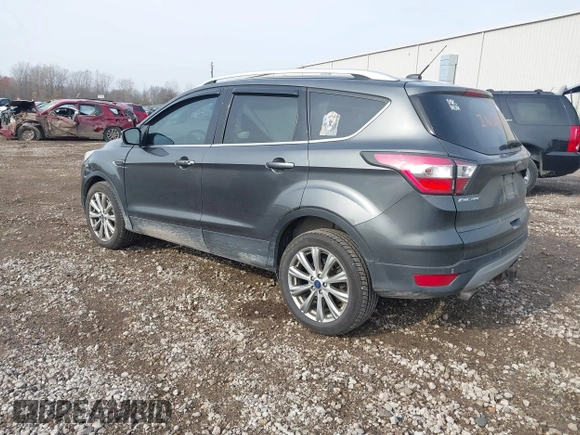 2017 Ford Escape Titanium with VIN 1FMCU9J98HUA49434, listed as a IAAI auction lot 40710866 with 143,850 mi miles. Bid and sale history available at carsss.com. Image 3.