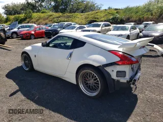 2014 Nissan 370Z Nismo with VIN JN1AZ4EH2EM630833, listed as a Copart auction lot 81773274 with 38,051 mi miles and Salvage Title. Bid and sale history available at DreamBid. Image 2.